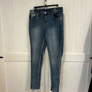 Venus medium wash, skinny leg stretch denim, 5 pocket styling size 14R